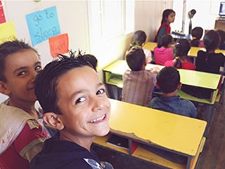 Teacher leading classroom lesson