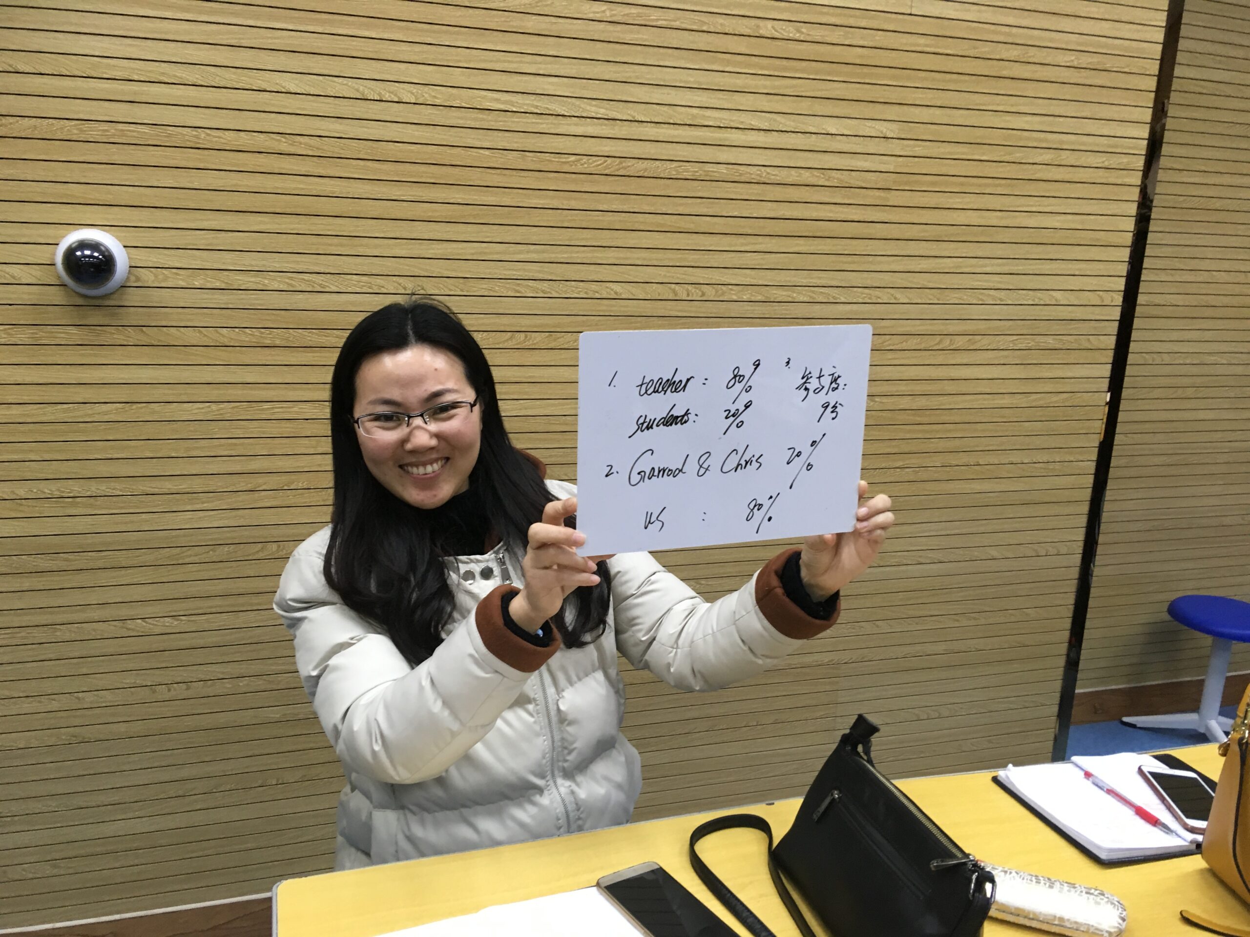 Teacher working with students on grammar